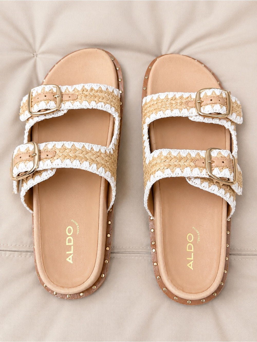 Aldo Natural Raffia Double-Buckle Slide Sandals with White Trim.
